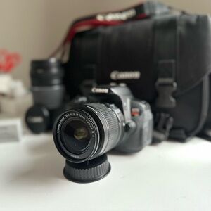 Canon Black Digital Camera with Lens and Bag